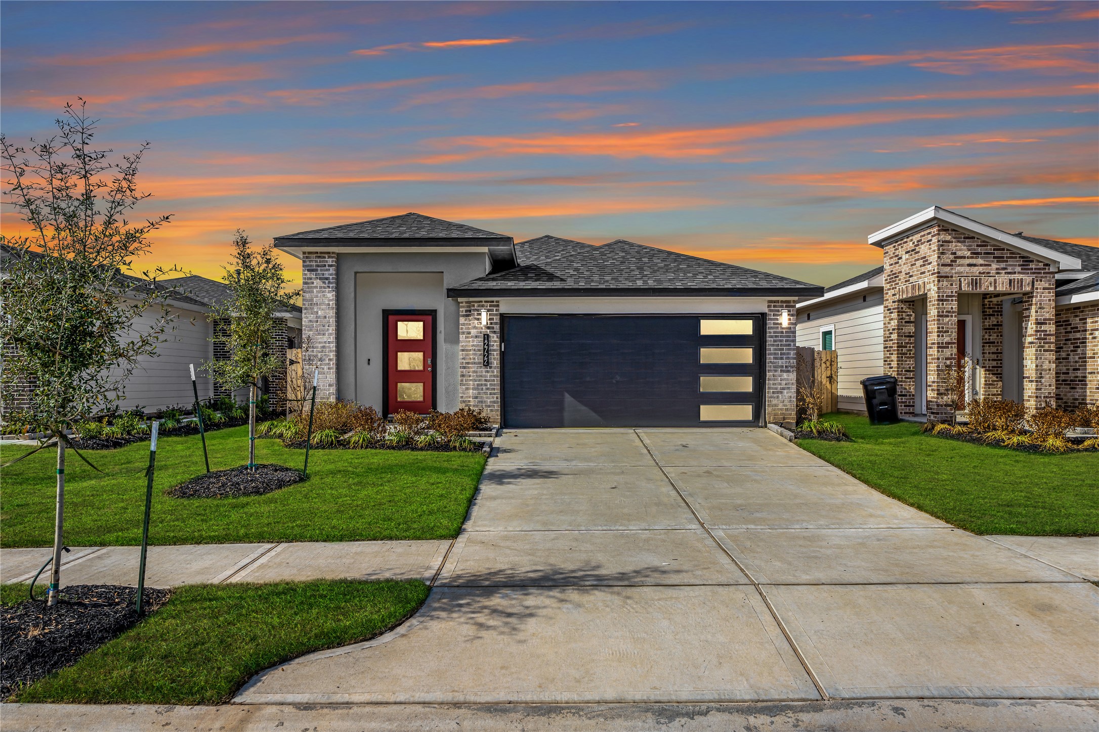 front view of a house with a yard