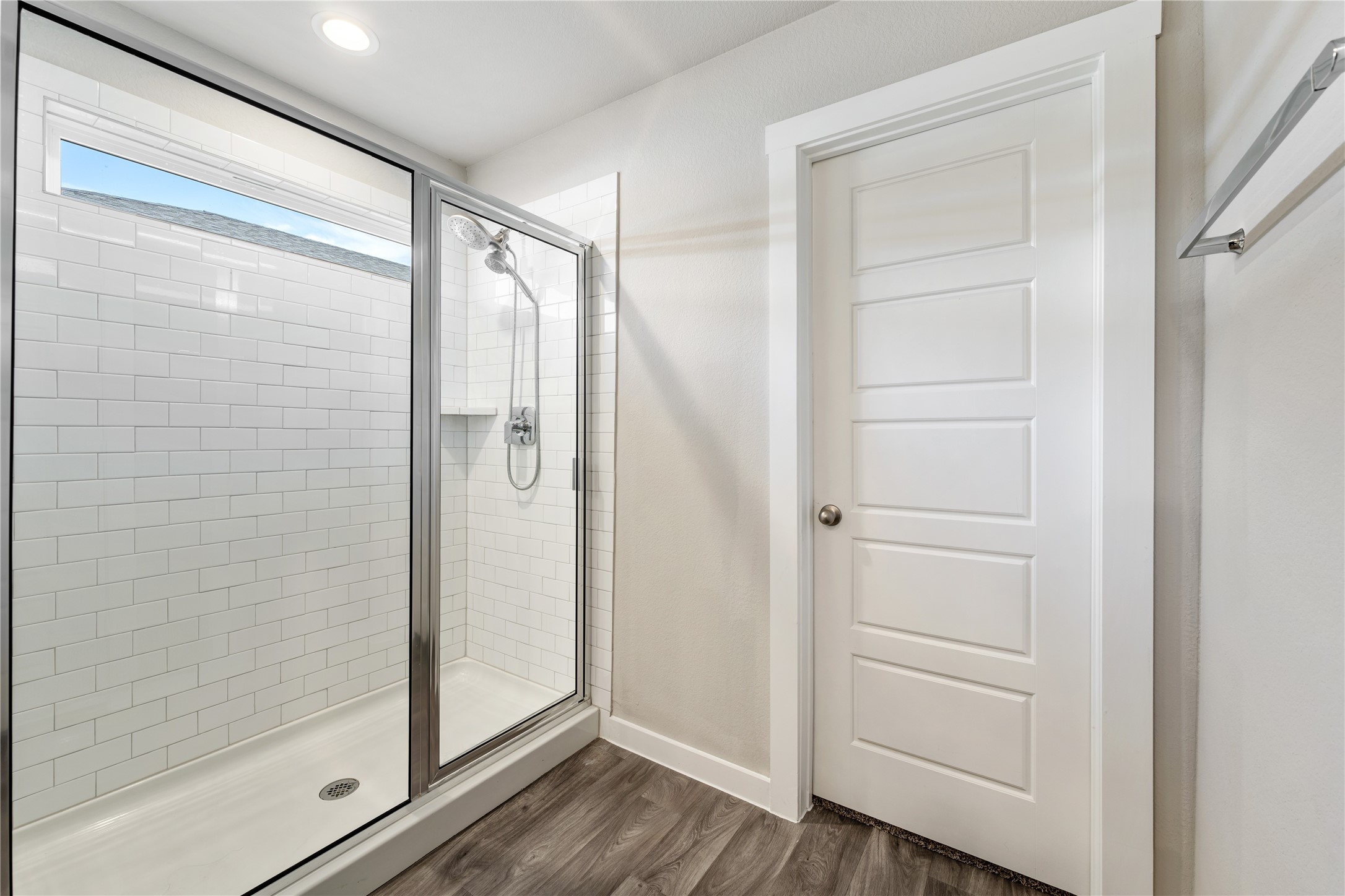 12722 Basinghall Lane Houston, TX 77047 - Photo 14 of 22 a bathroom with a glass door shower