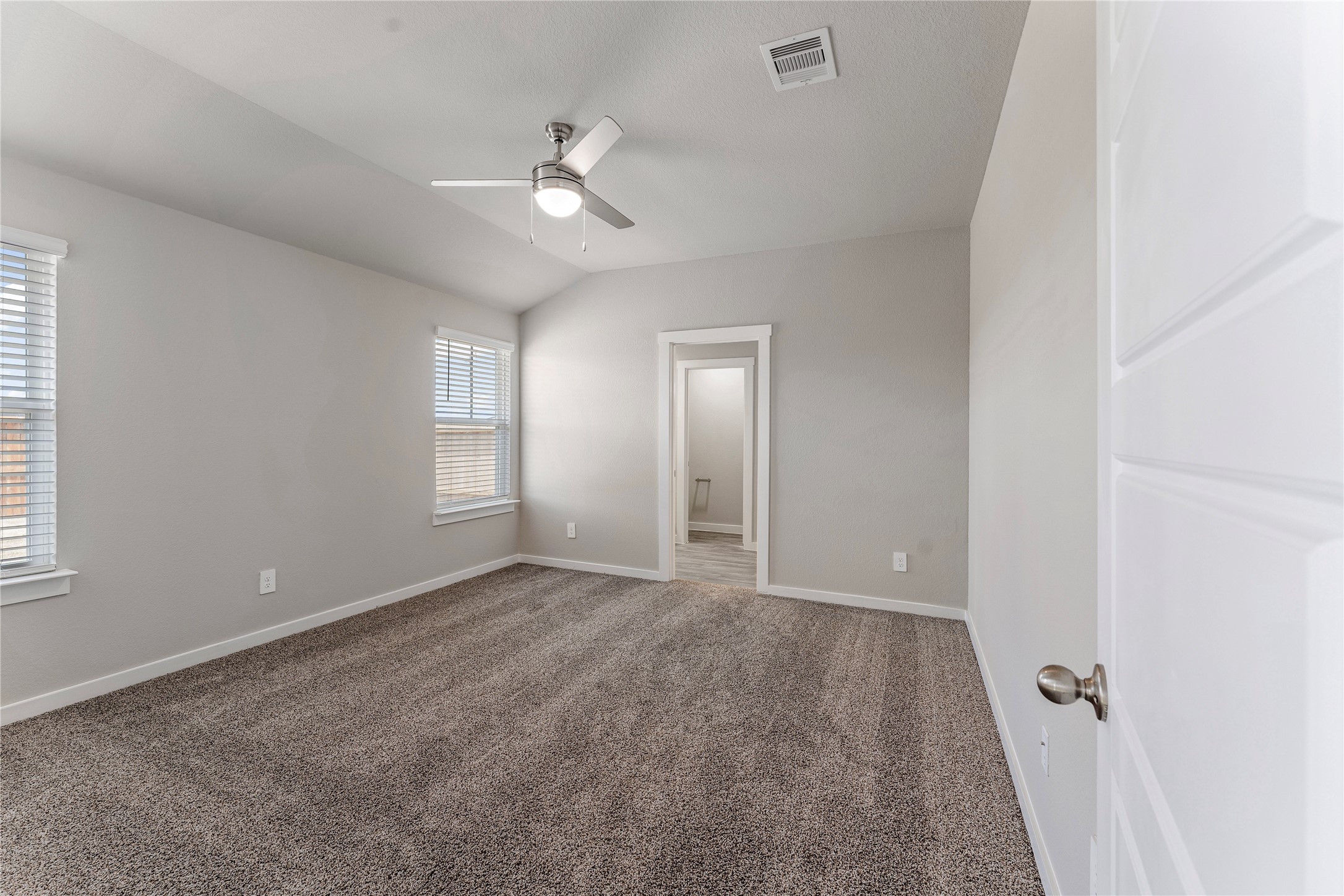 12722 Basinghall Lane Houston, TX 77047 - Photo 15 of 22 a view of an empty room with a window