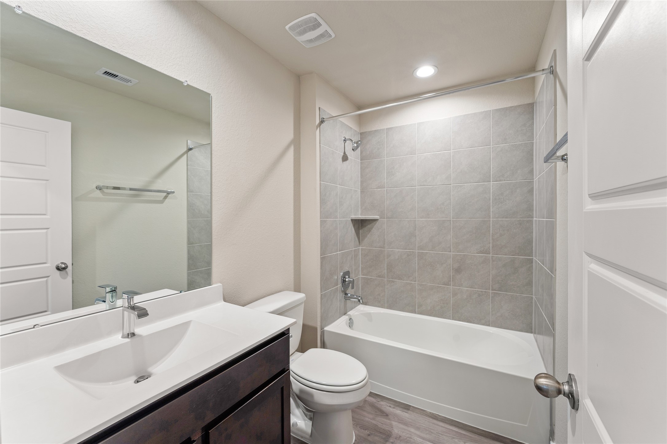 12722 Basinghall Lane Houston, TX 77047 - Photo 17 of 22 a bathroom with a sink a toilet and shower