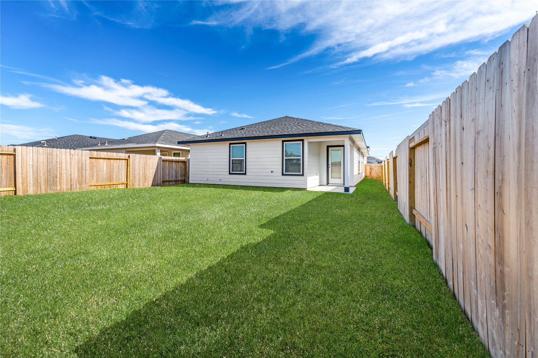 12722 Basinghall Lane Houston, TX 77047 - Photo 2 of 22 a view of a house with backyard and porch