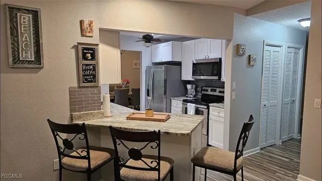 a view of a dining room with furniture