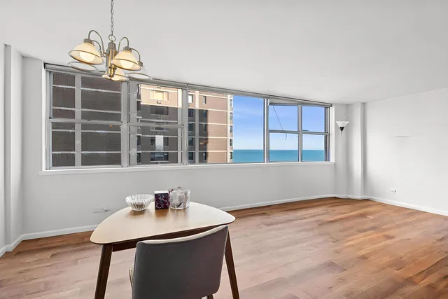 a workspace with furniture and window