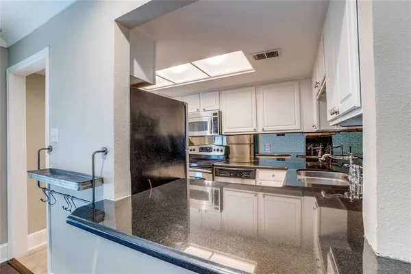 $198,000 | 10209 Regal Oaks Drive, Unit 112, Dallas, TX 75230