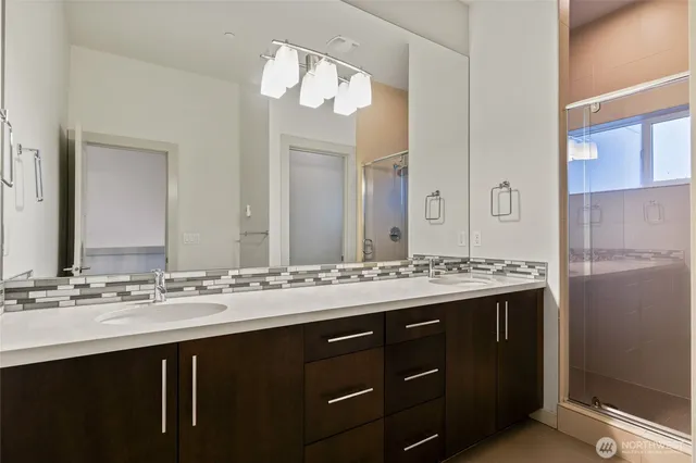 a view of a bathroom with a glass door