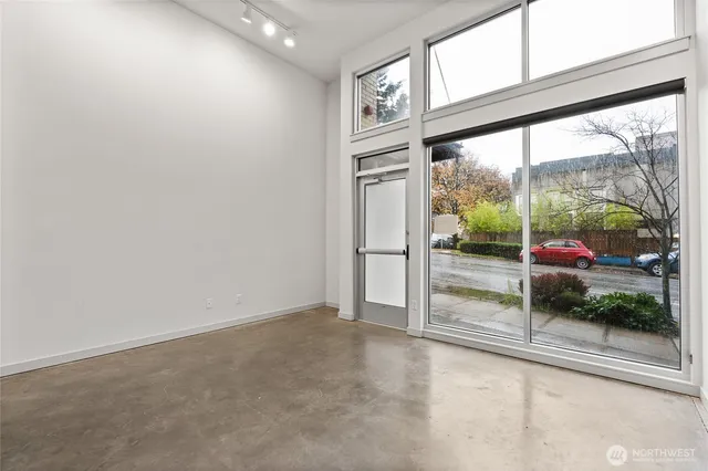 a view of a room with a large window