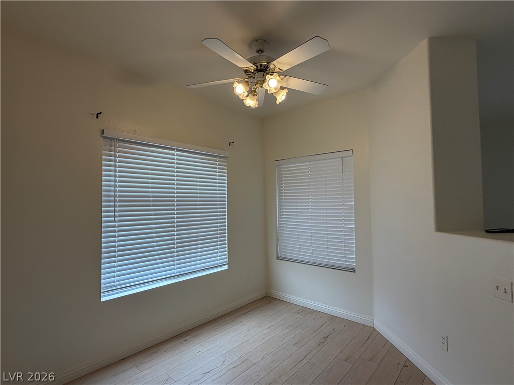 5525 West Flamingo Road, Unit 2016 Las Vegas, NV 89103 - Photo 9 of 20 Unfurnished dining area featuring light wood finished floors and a ceiling fan