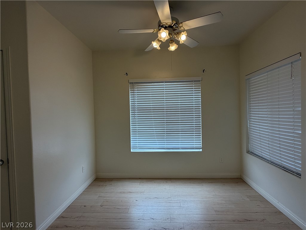 5525 West Flamingo Road, Unit 2016 Las Vegas, NV 89103 - Photo 10 of 20 Unfurnished room with a ceiling fan and light wood-style flooring