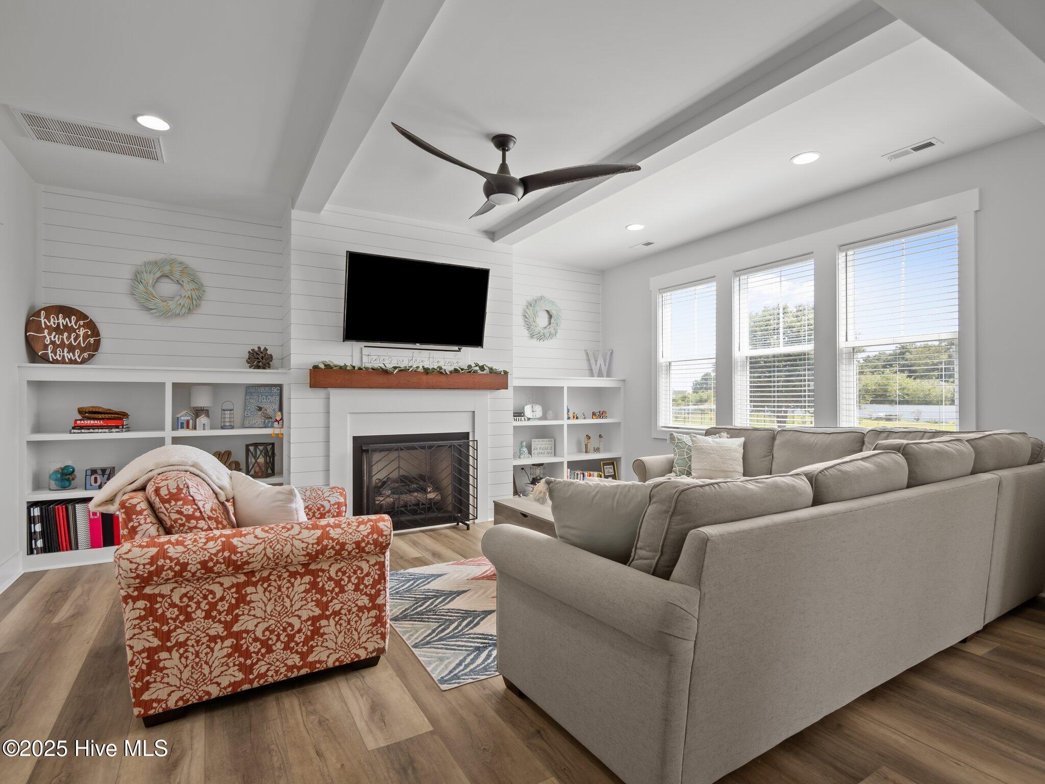 208 Coastline Circle Cedar Point, NC 28584 - Photo 16 of 66 Living room with gas fireplace