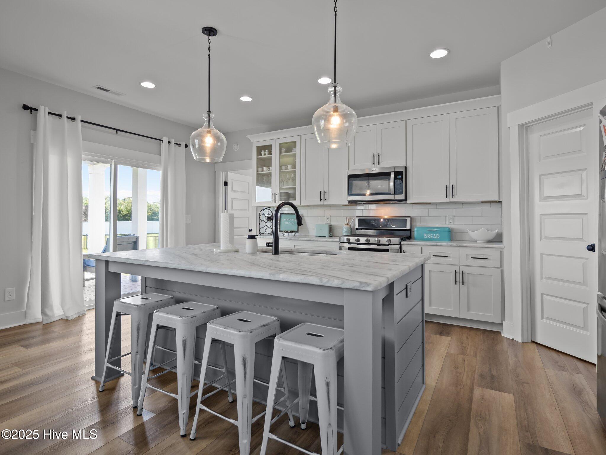 208 Coastline Circle Cedar Point, NC 28584 - Photo 19 of 66 Kitchen Island