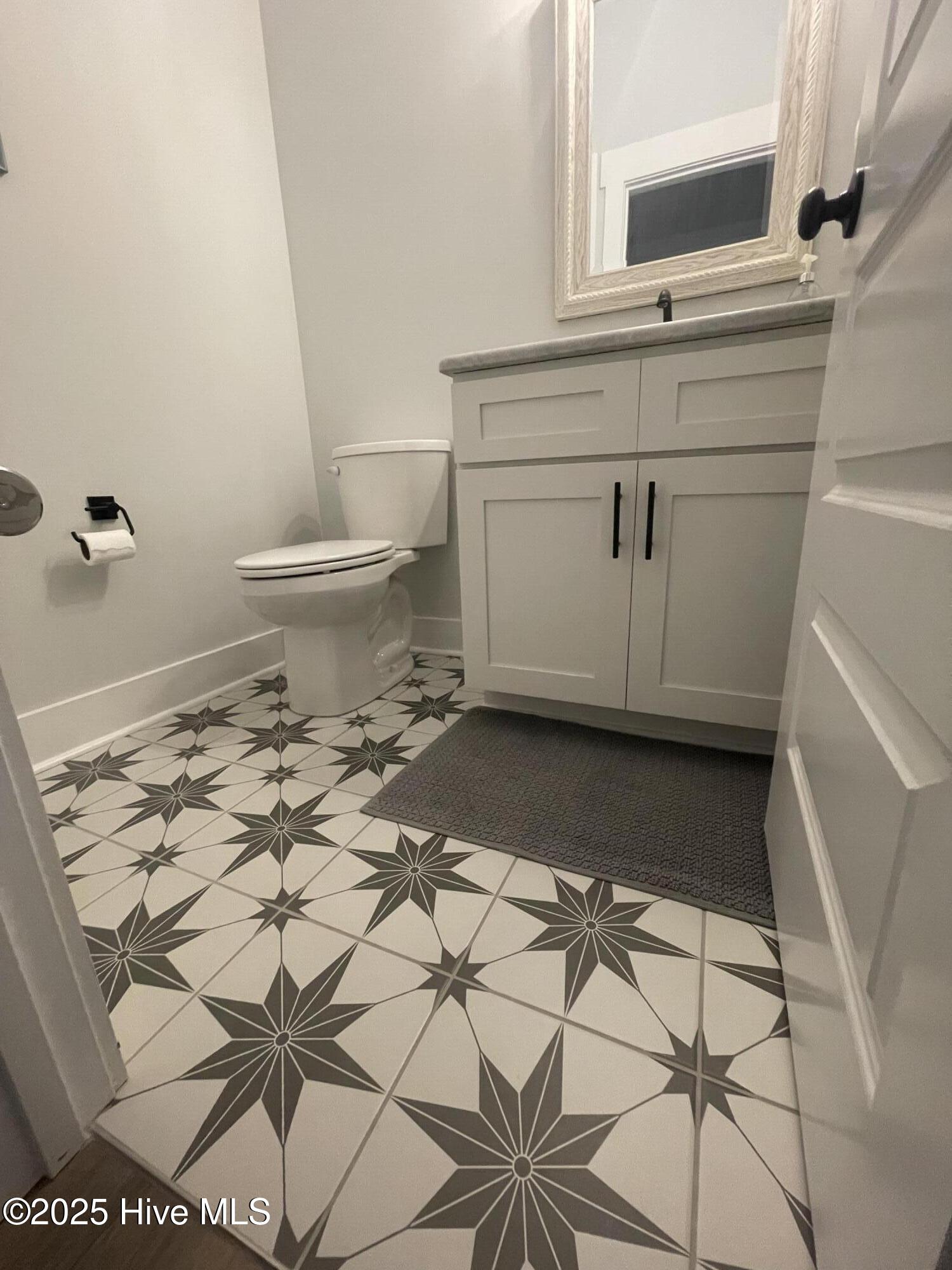 208 Coastline Circle Cedar Point, NC 28584 - Photo 28 of 66 Half Bath Floor Tile!