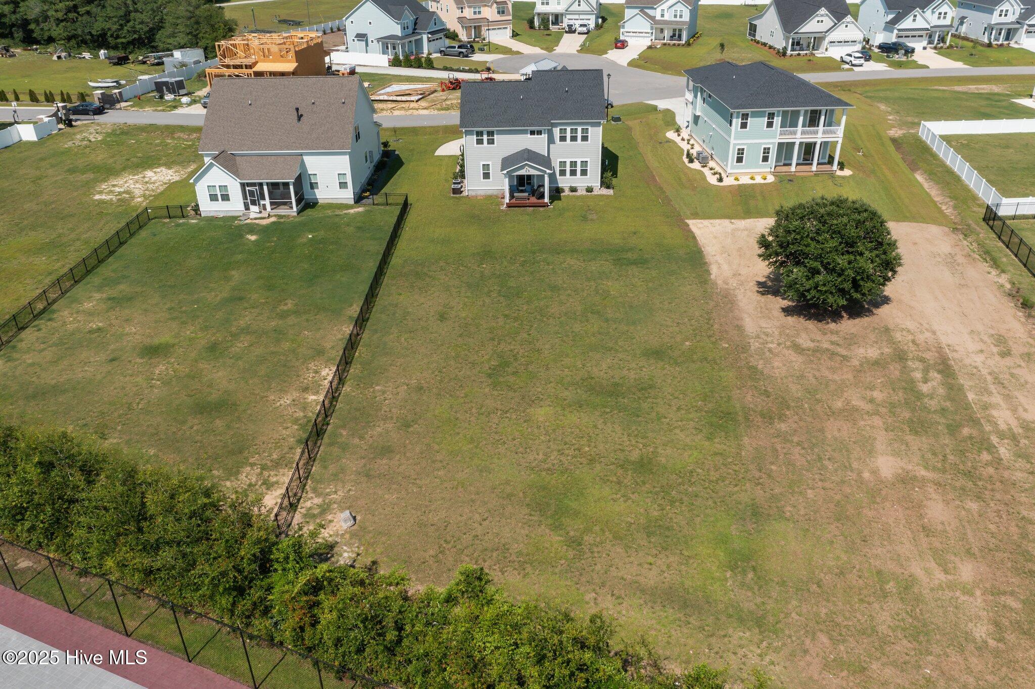 208 Coastline Circle Cedar Point, NC 28584 - Photo 4 of 66 Large Back yard backing up to Magens Bay