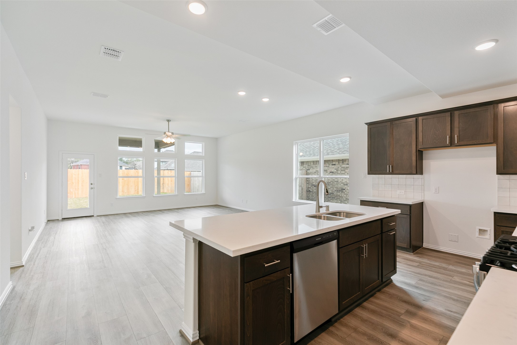 2710 Alexis Street Seabrook, TX 77586 - Photo 11 of 46 a kitchen with sink cabinets and wooden floor