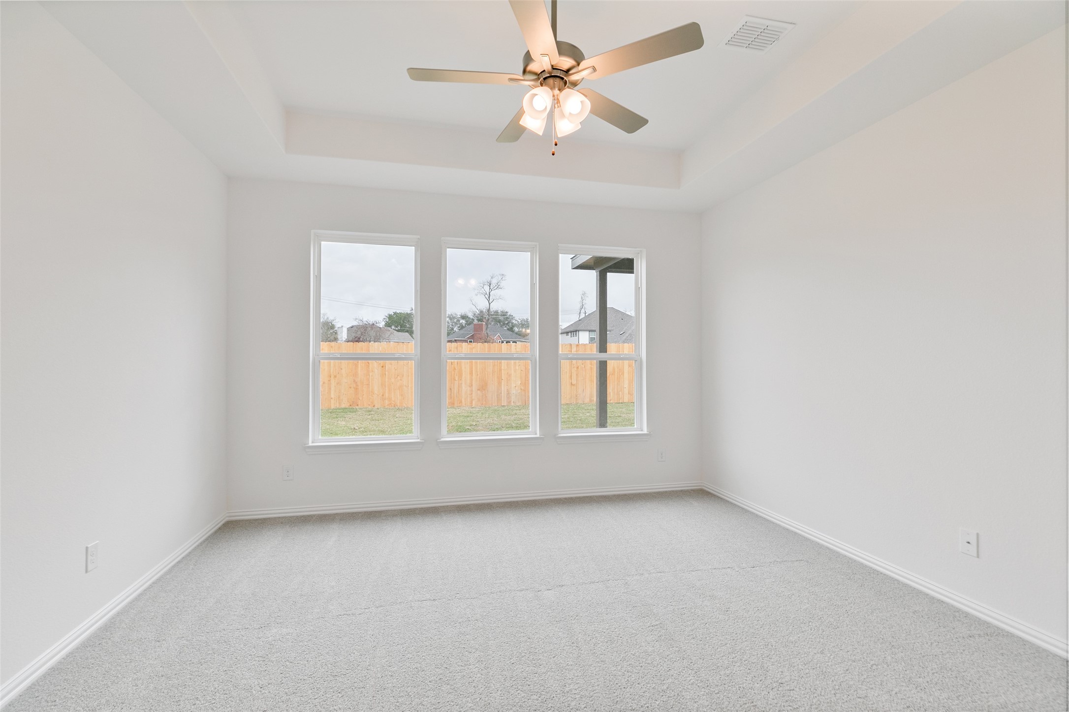 2710 Alexis Street Seabrook, TX 77586 - Photo 23 of 46 an empty room with a window and a fan