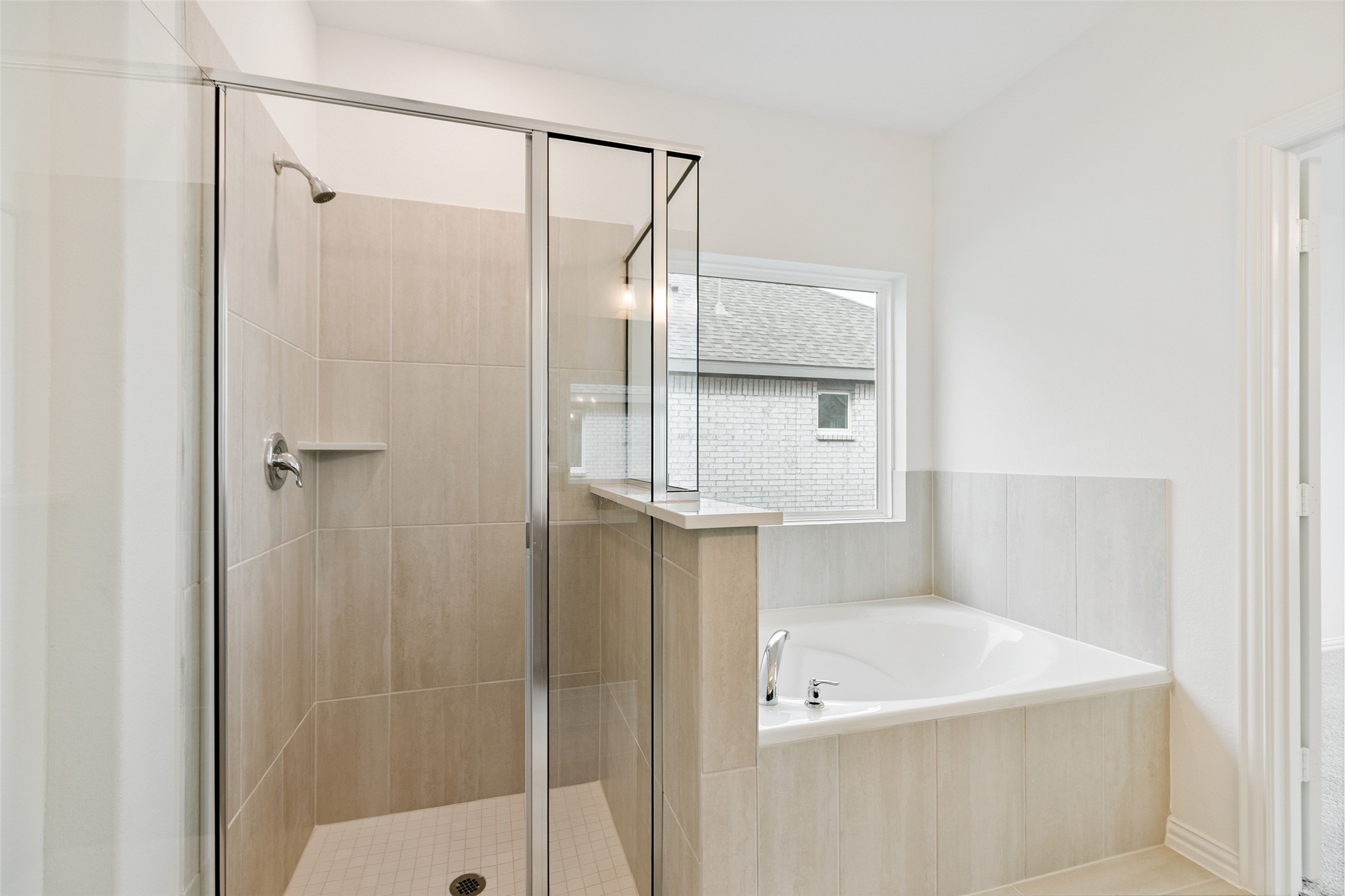 2710 Alexis Street Seabrook, TX 77586 - Photo 26 of 46 a bathroom with a tub shower and sink