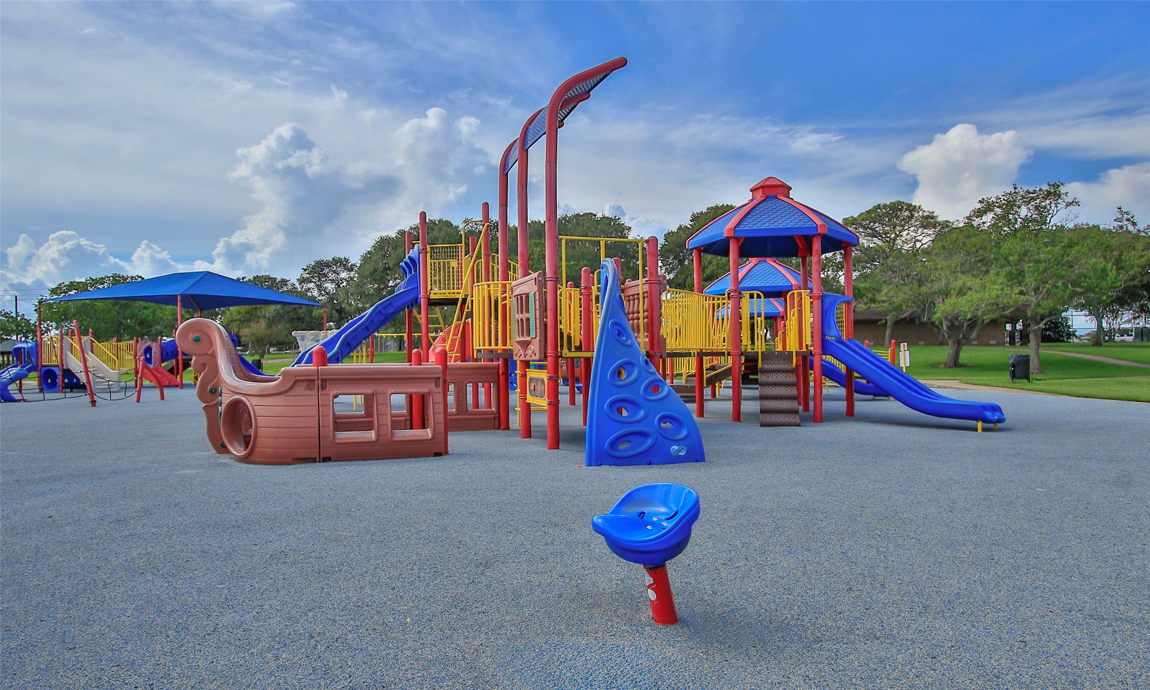 2710 Alexis Street Seabrook, TX 77586 - Photo 45 of 46 a childrens park with lots of swings and slides