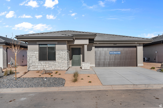 1589 South Fins Road, Unit 4178 Washington, UT 84780 - Photo 2 of 30 Modern single-story residence with a stucco and stone veneer facade
