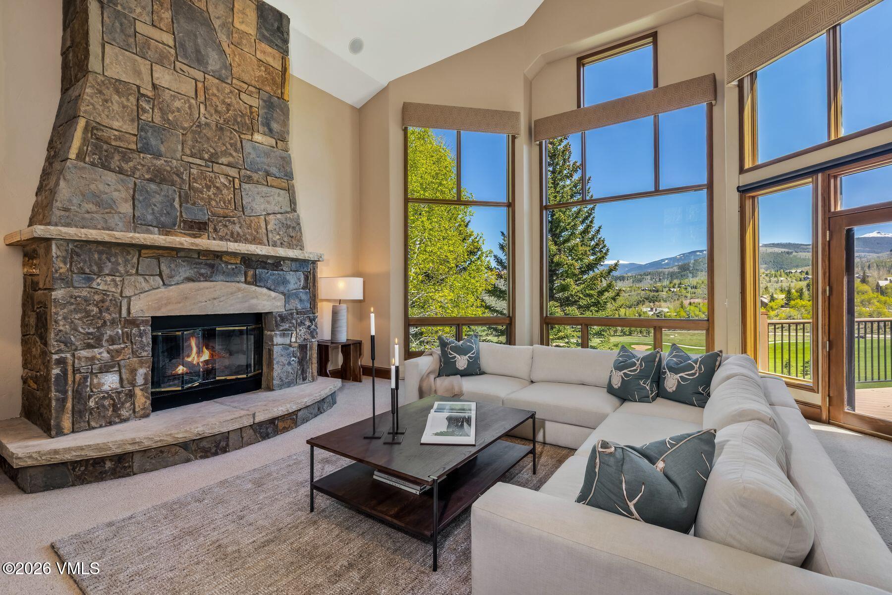 167 Saddle Ridge Edwards, CO 81632 - Photo 20 of 41 a living room with furniture and a fireplace