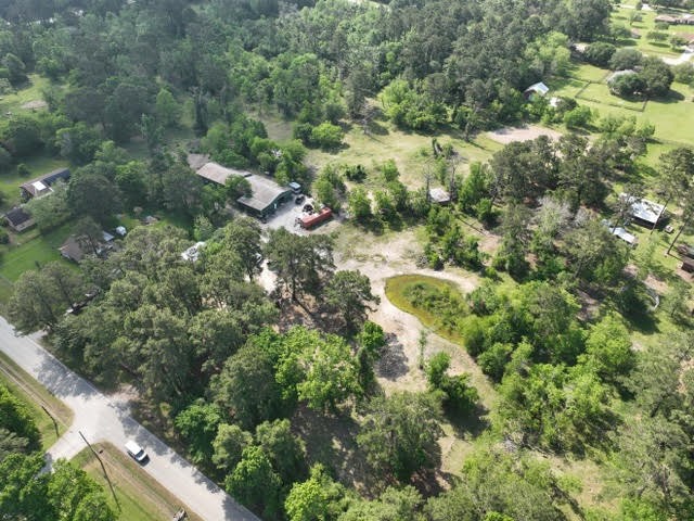 435 Indian Shores Road Crosby, TX 77532 - Photo 2 of 13 Partially cleared & partially wooded.