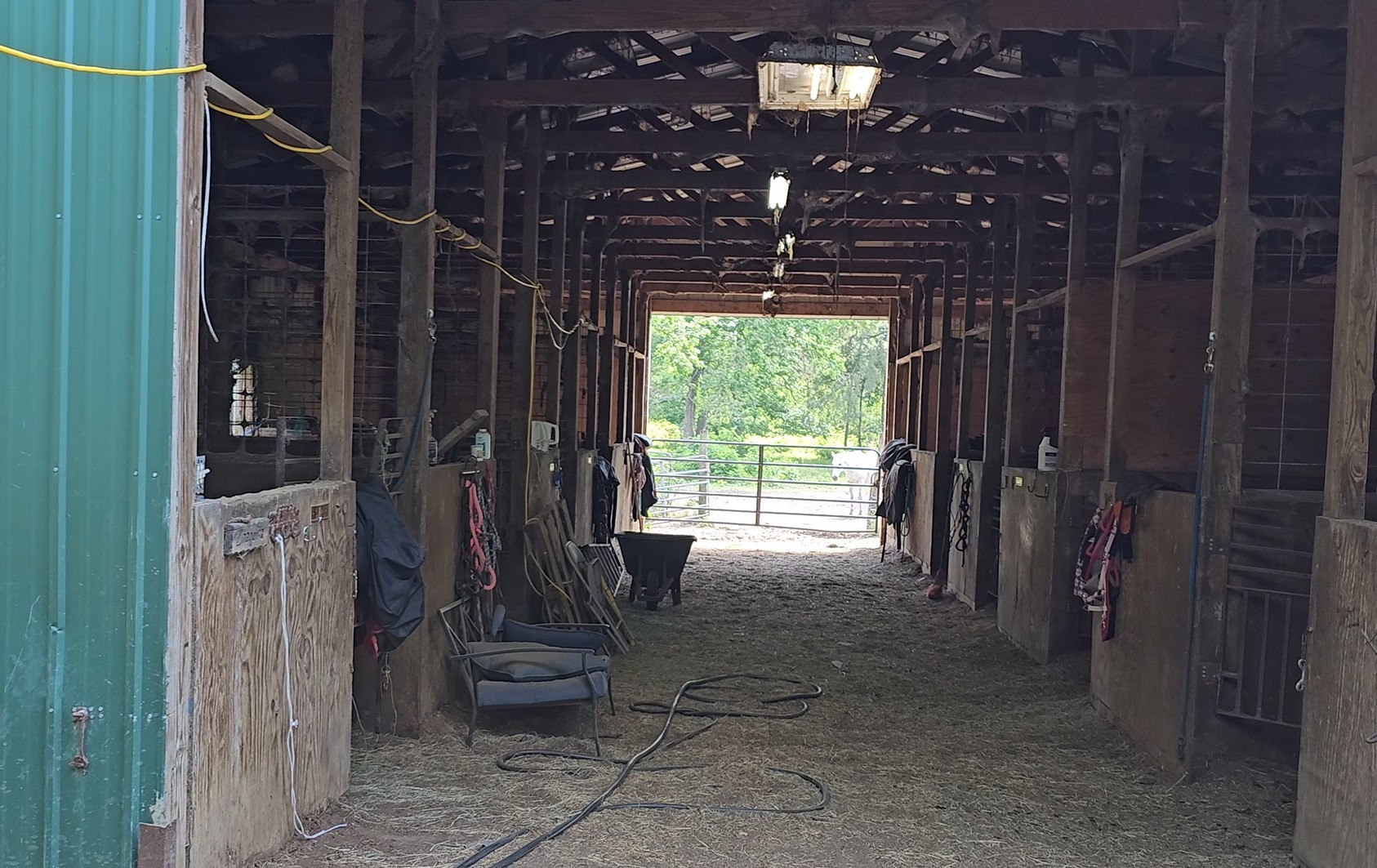 435 Indian Shores Road Crosby, TX 77532 - Photo 8 of 13 1st barn has 2 tack rooms, 1 bathroom, 6 stalls