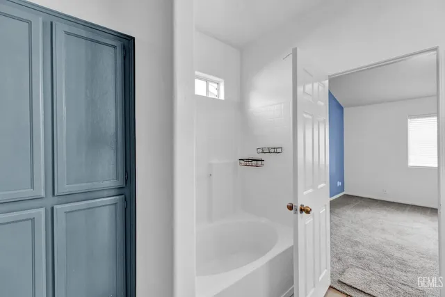 a bathroom with a bathtub