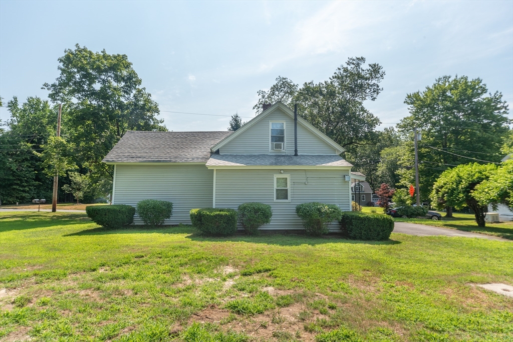 88 Shirley Road Lancaster, MA 01523 - Photo 3 of 31 a front view of a house with garden