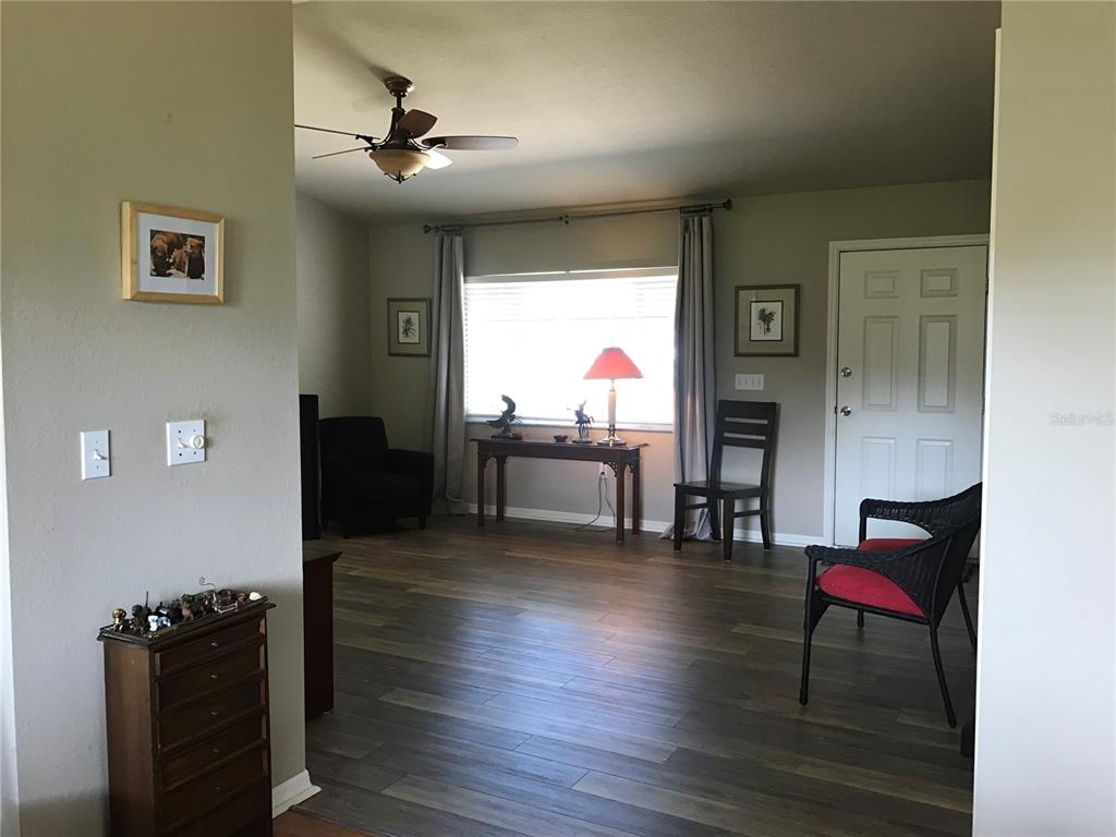 11879 Southwest 137th Loop Dunnellon, FL 34432 - Photo 12 of 37 a living room with furniture and a window