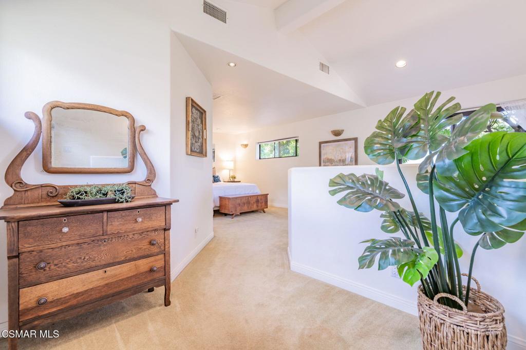 6078 Peppertree Lane Simi Valley, CA 93063 - Photo 32 of 59 a living room with furniture and a potted plant