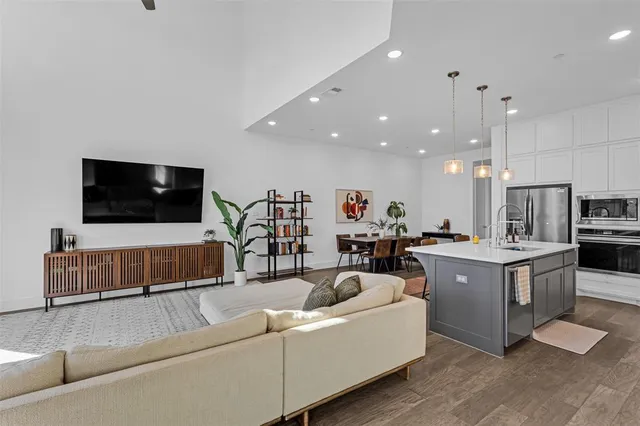 an aerial view of a house with a swimming pool