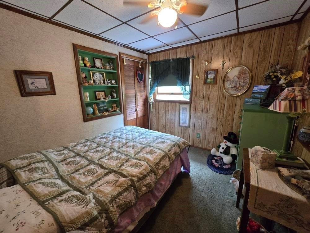 4212 Dayton Road New Bethlehem, PA 16242 - Photo 22 of 31 a bedroom with a bed and a window