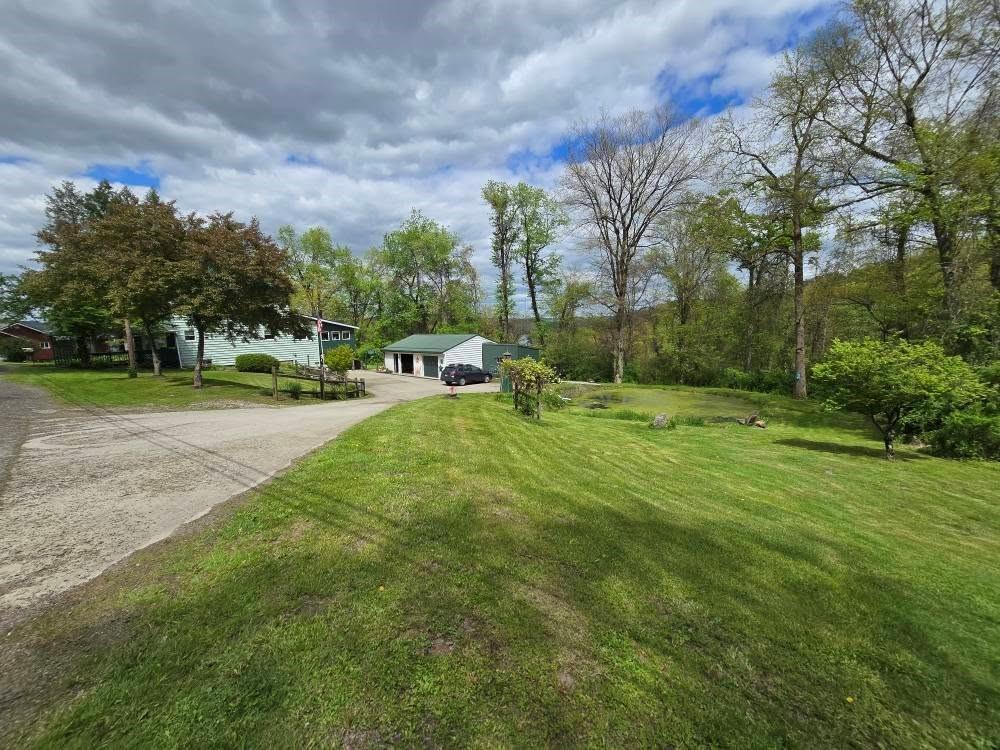 4212 Dayton Road New Bethlehem, PA 16242 - Photo 5 of 31 a view of a park with large trees
