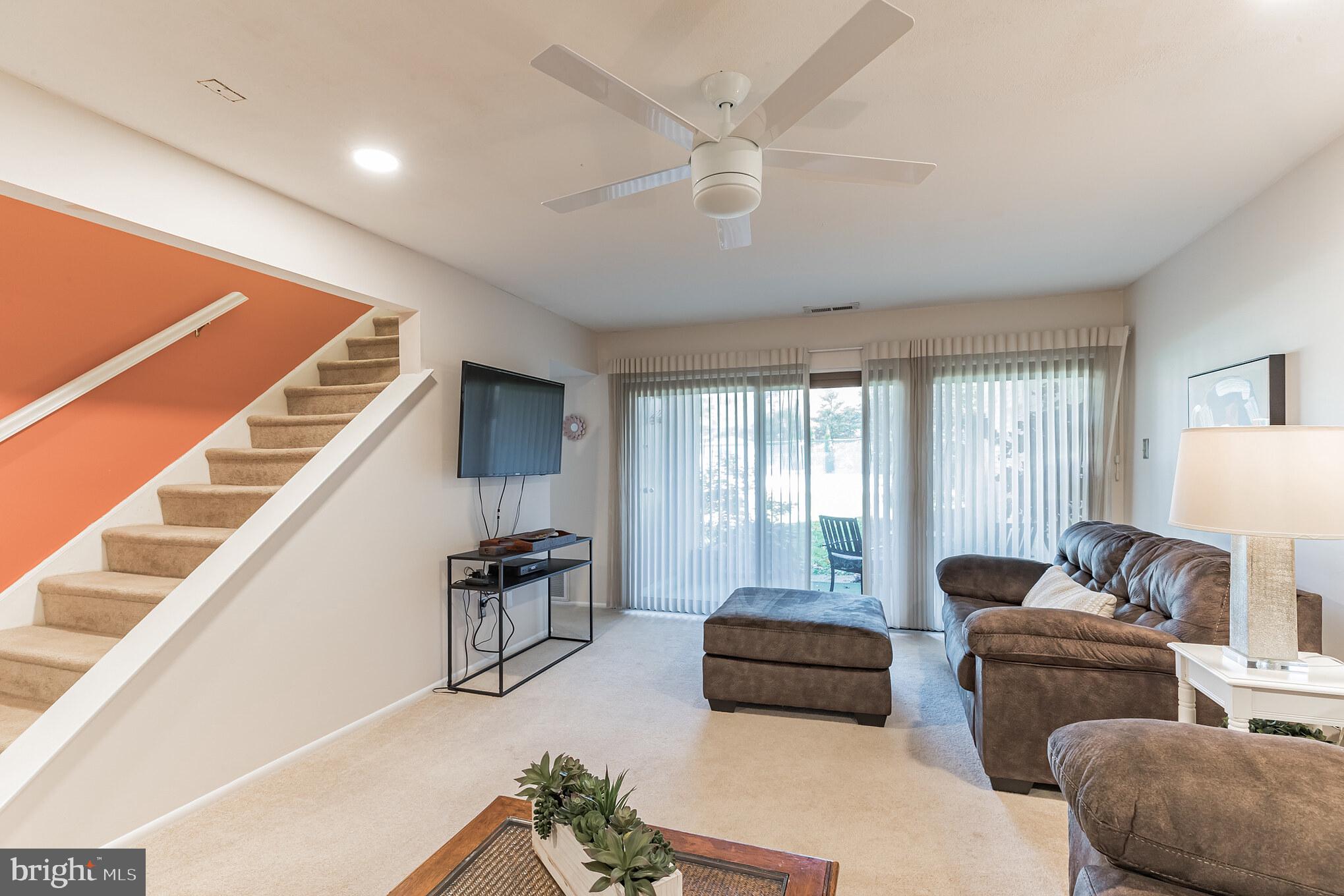 403 Raintree Lane Malvern, PA 19355 - Photo 12 of 25 Spacious Family Room with main level deck