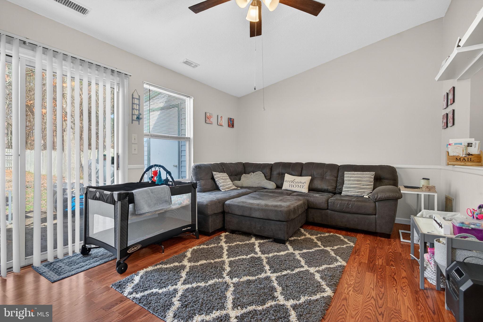 147 Baker Avenue Atco, NJ 08004 - Photo 13 of 31 a living room with furniture and a rug