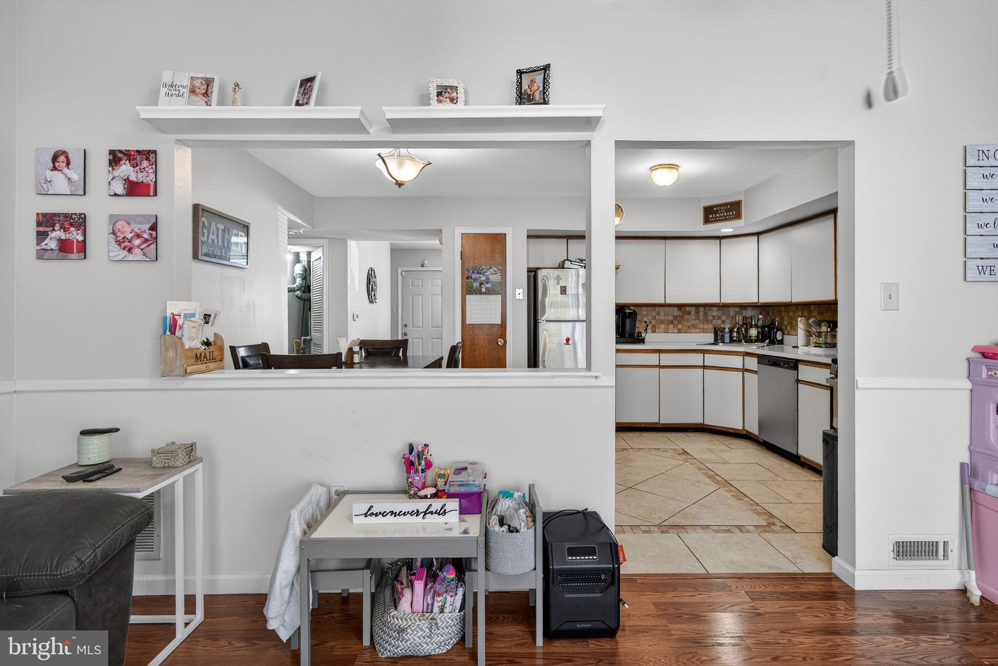 147 Baker Avenue Atco, NJ 08004 - Photo 14 of 31 a kitchen with a refrigerator and cabinets