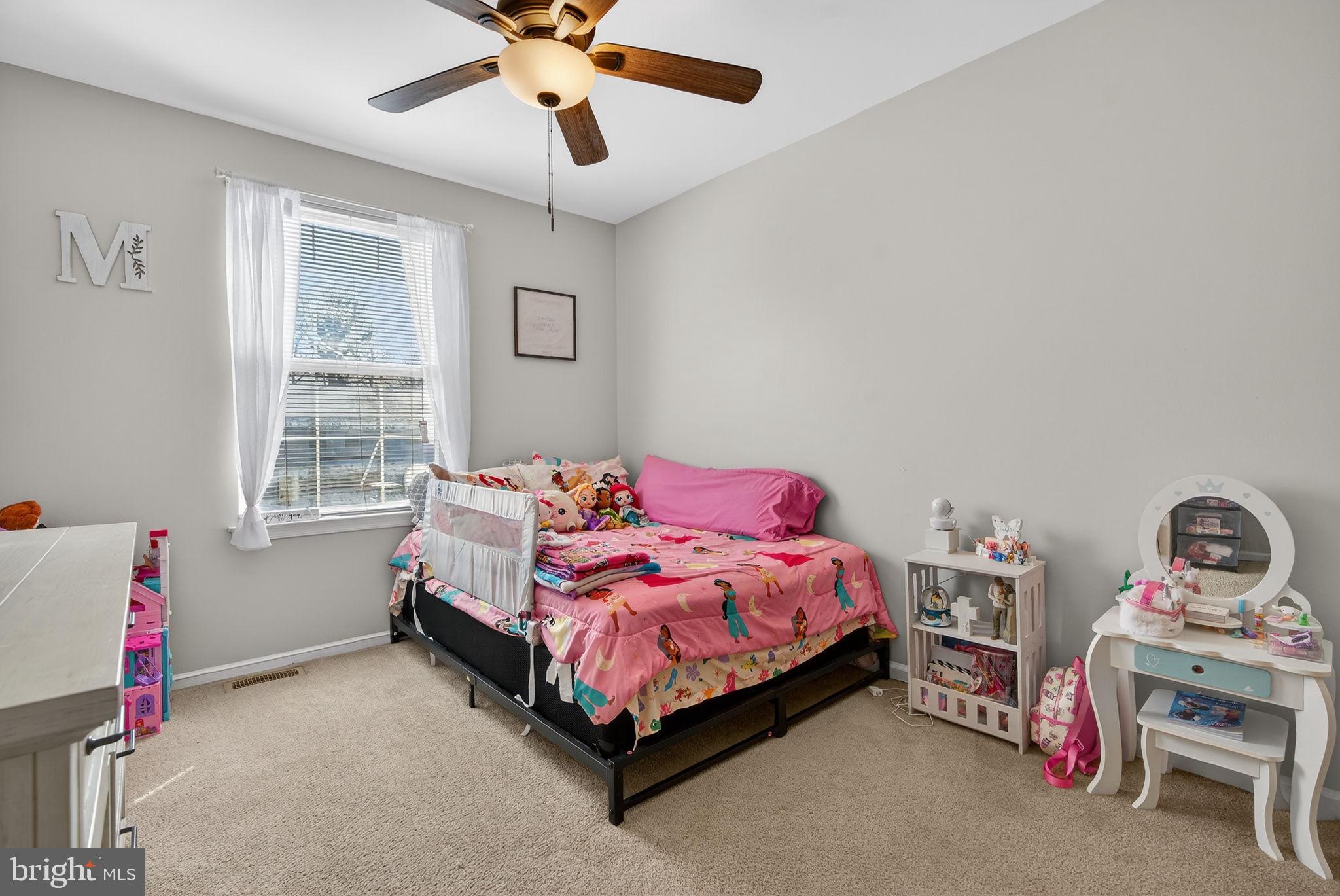 147 Baker Avenue Atco, NJ 08004 - Photo 24 of 31 a bed room with a bed and a window