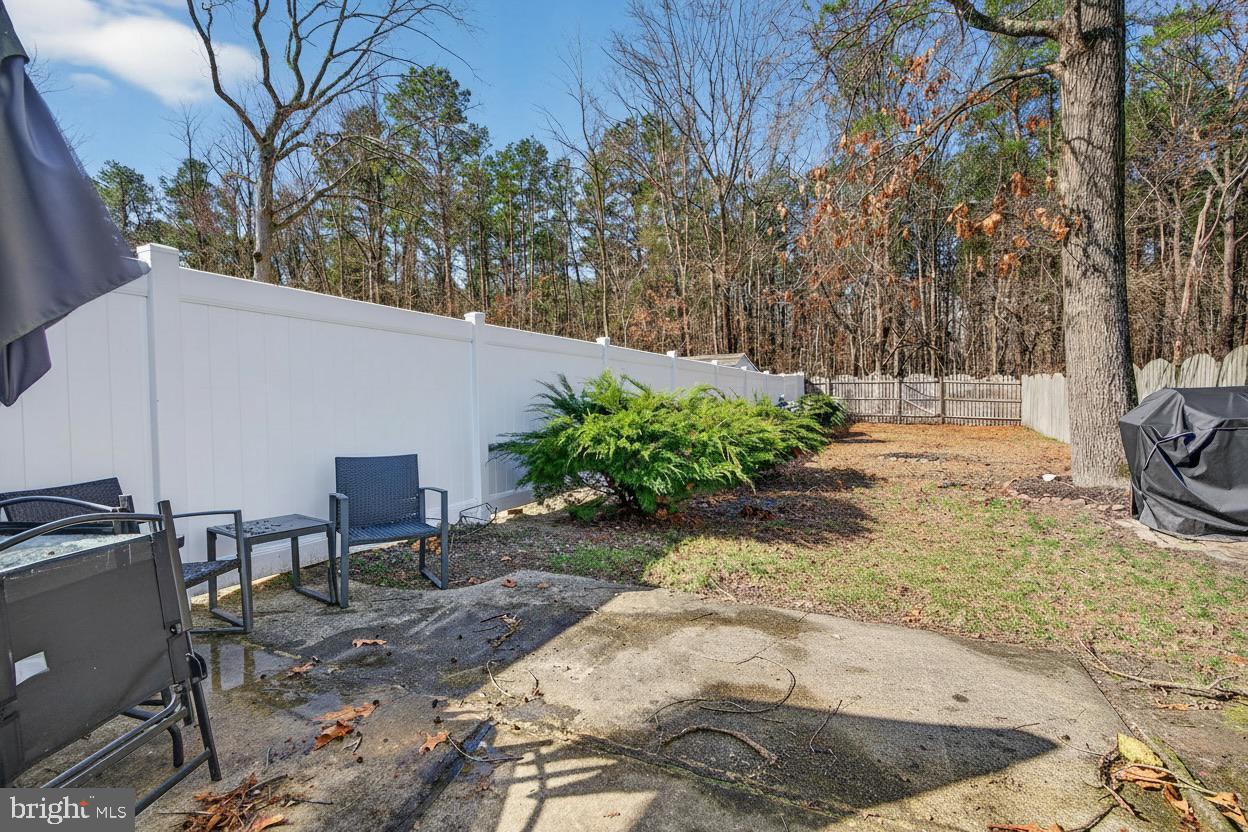 147 Baker Avenue Atco, NJ 08004 - Photo 26 of 31 a view of a backyard with chairs