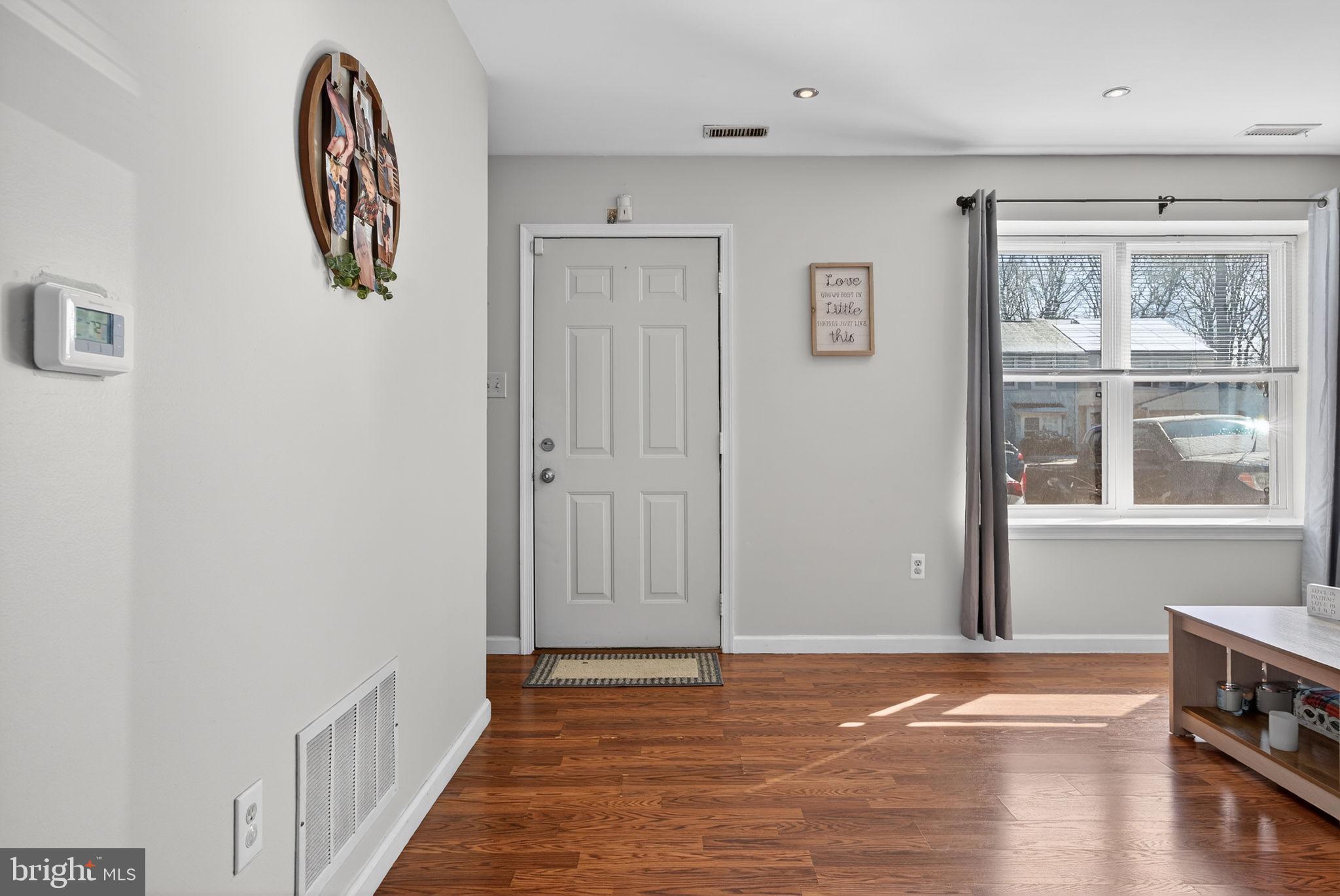 147 Baker Avenue Atco, NJ 08004 - Photo 4 of 31 a view of livingroom with hardwood floor and hallway