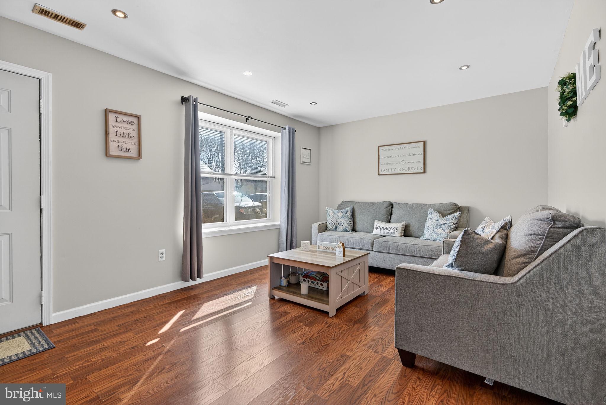 147 Baker Avenue Atco, NJ 08004 - Photo 6 of 31 a living room with furniture and a window