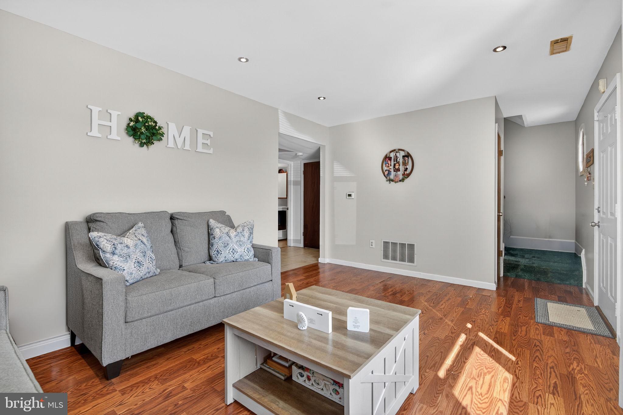 147 Baker Avenue Atco, NJ 08004 - Photo 7 of 31 a living room with furniture and a rug
