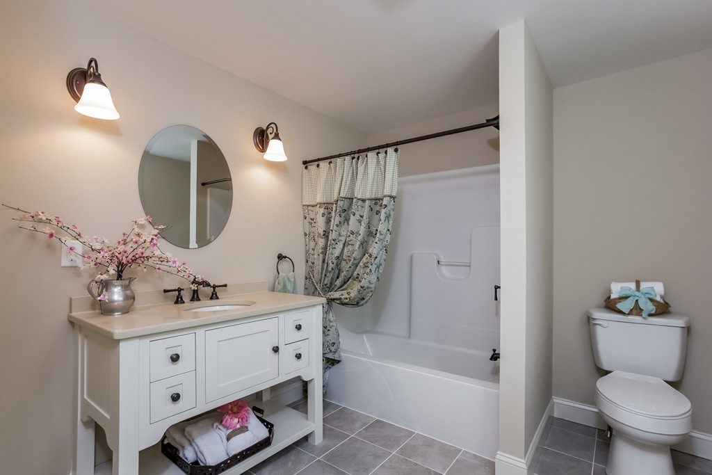 321 Cap'n Lijah's Road Barnstable, MA 02632 - Photo 7 of 10 a bathroom with a sink a toilet and shower