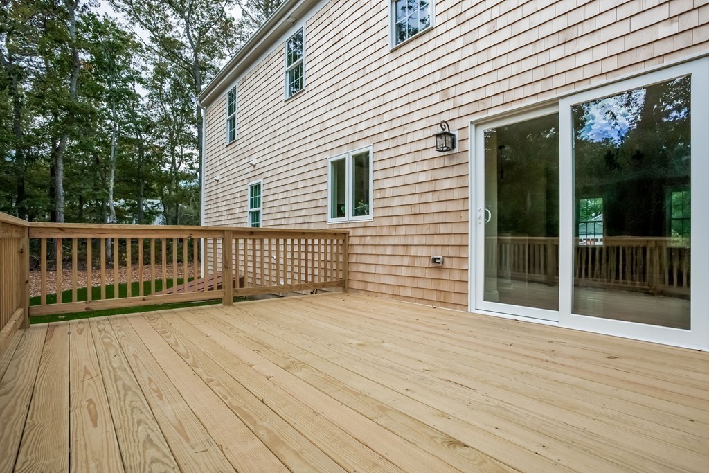 321 Cap'n Lijah's Road Barnstable, MA 02632 - Photo 8 of 10 a view of a wooden deck