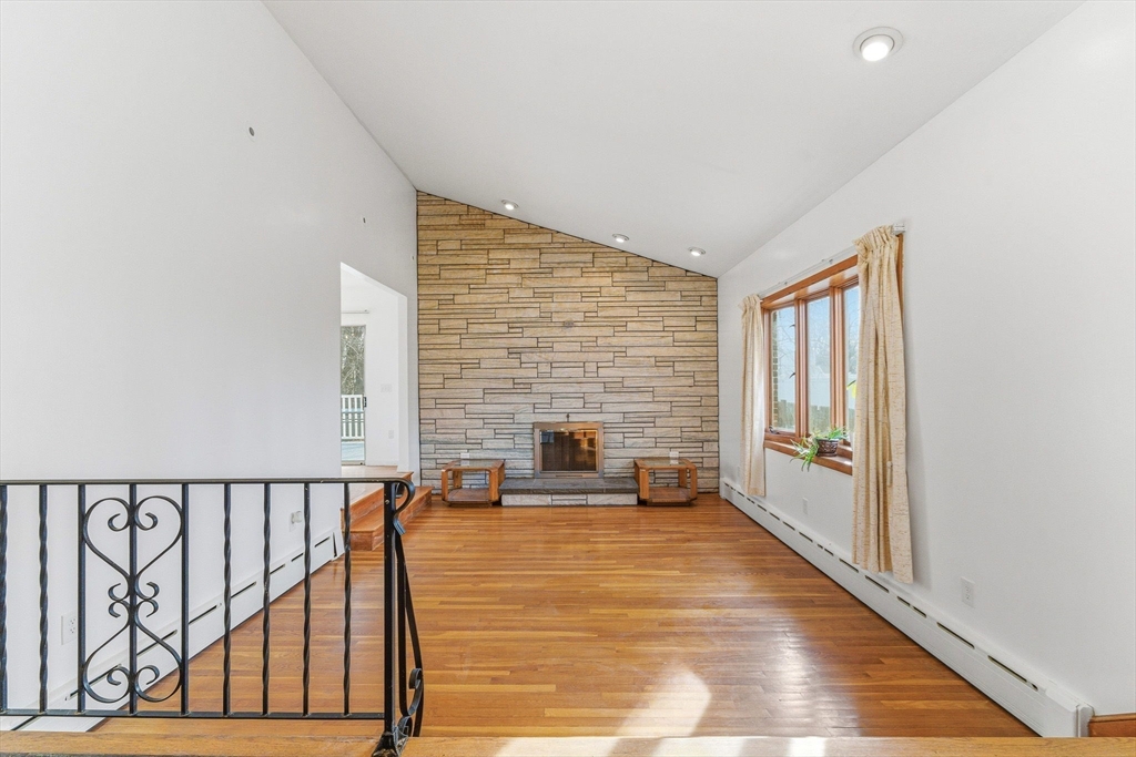 7 Carol Street Stoneham, MA 02180 - Photo 2 of 28 a view of a livingroom with wooden floor and furniture