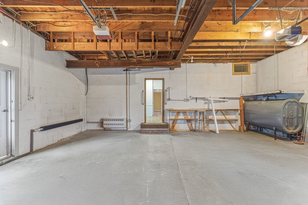 7 Carol Street Stoneham, MA 02180 - Photo 23 of 28 a view of a room with gym equipment