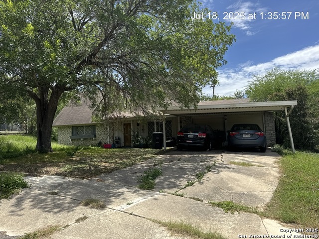 206 Threadneedle Lane San Antonio, TX 78227 - Photo 4 of 4 a view of a house with a yard and garage