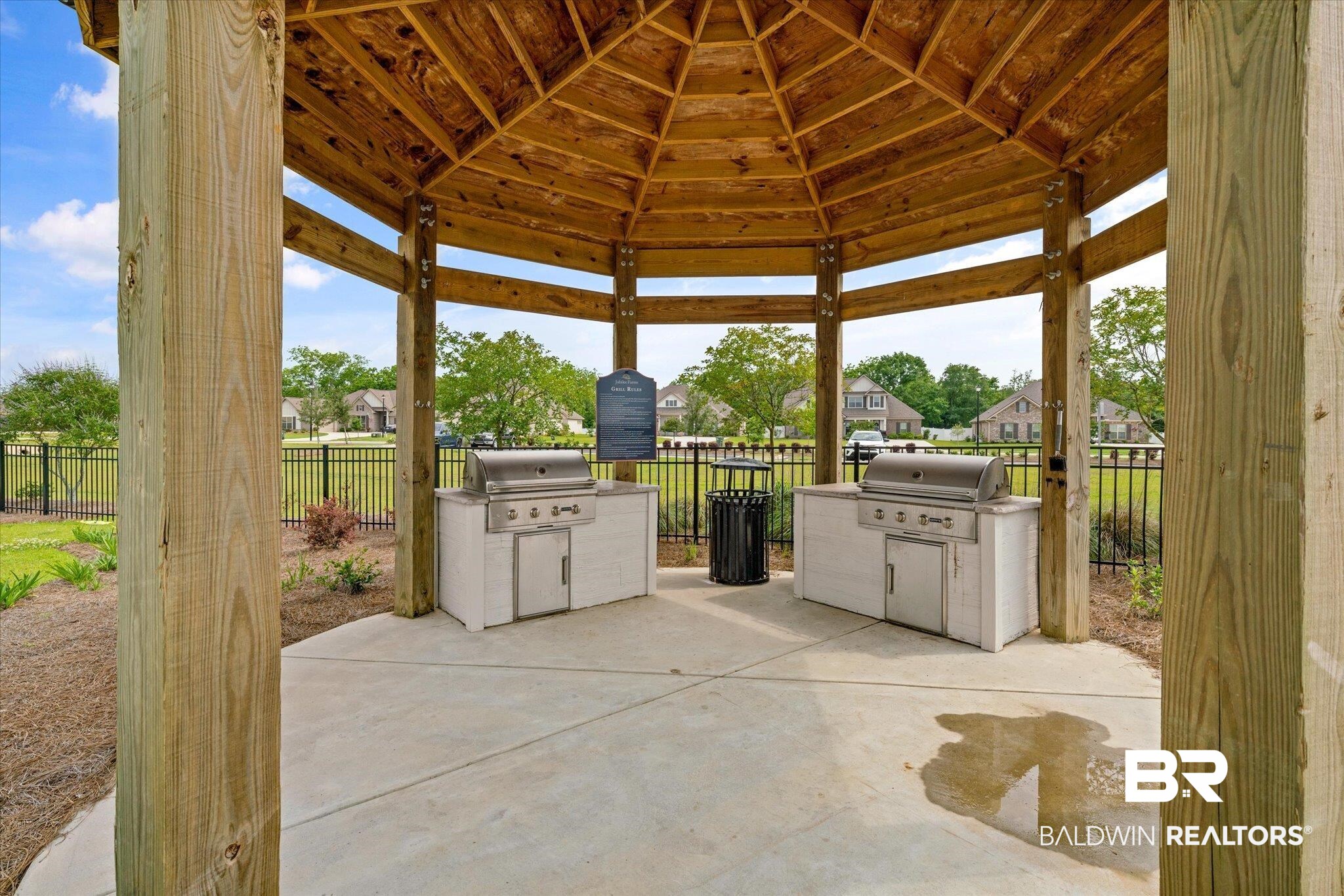 24262 Alydar Loop Daphne, AL 36526 - Photo 27 of 33 View of patio / terrace with an outdoor kitchen, area for grilling, fence, and a gazebo