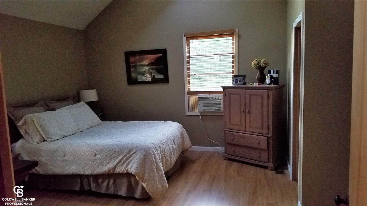 7630 Lapeer Road Avoca, MI 48006 - Photo 8 of 24 This is a view of the master bedroom.