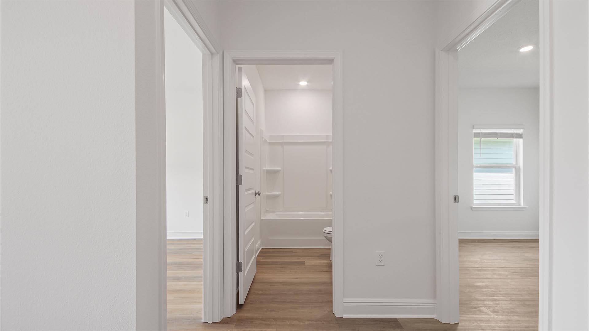 363 Holley Grv Lane Santa Rosa Beach, FL 32459 - Photo 24 of 37 a view of a bathroom from a corridor