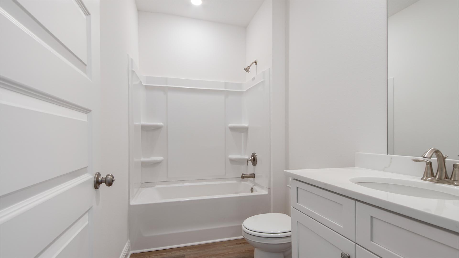 363 Holley Grv Lane Santa Rosa Beach, FL 32459 - Photo 29 of 37 a bathroom with a sink toilet and bathtub