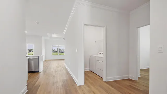 an empty room with wooden floor