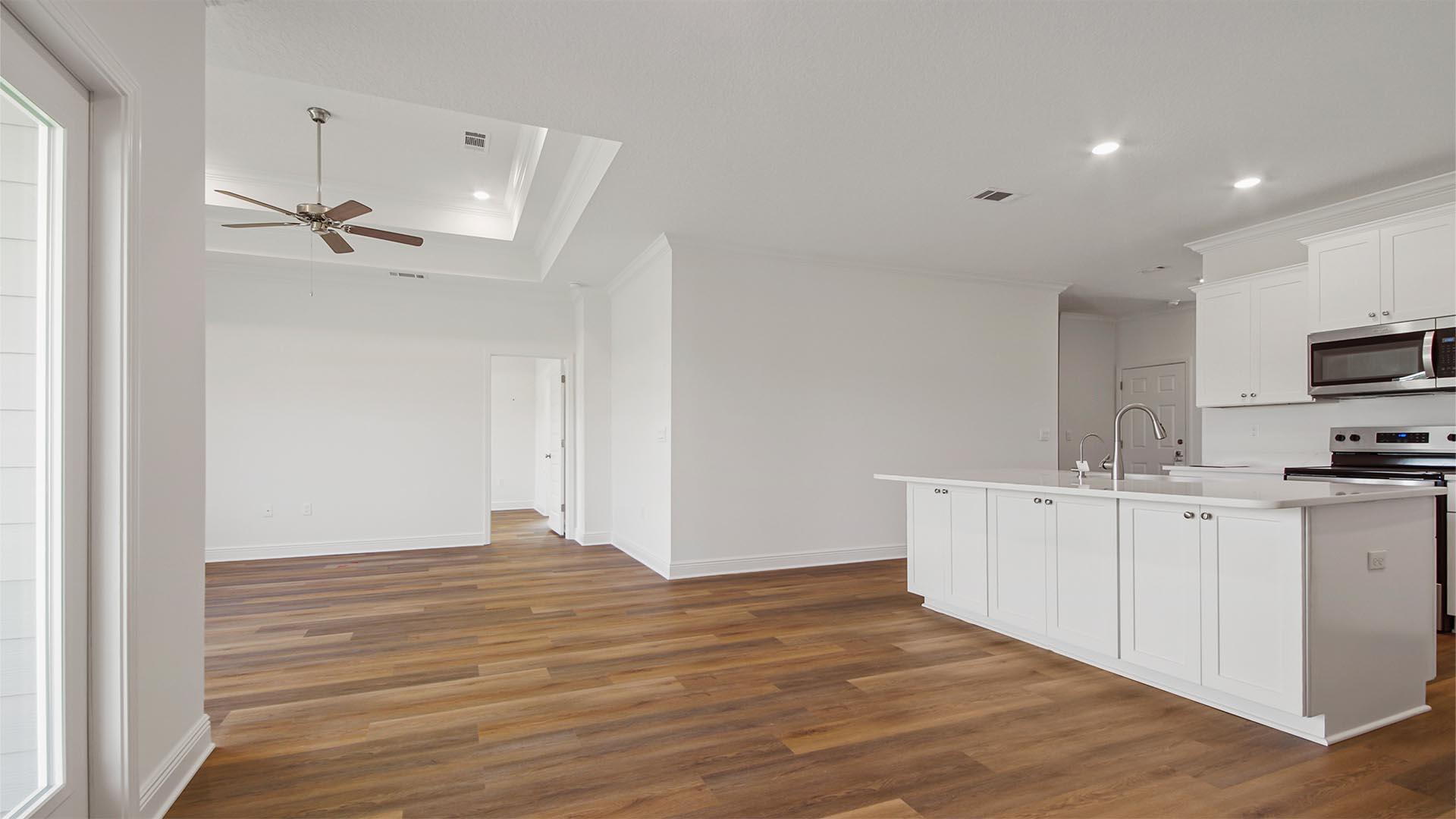363 Holley Grv Lane Santa Rosa Beach, FL 32459 - Photo 10 of 37 a view of a kitchen with stainless steel appliances a sink and a refrigerator